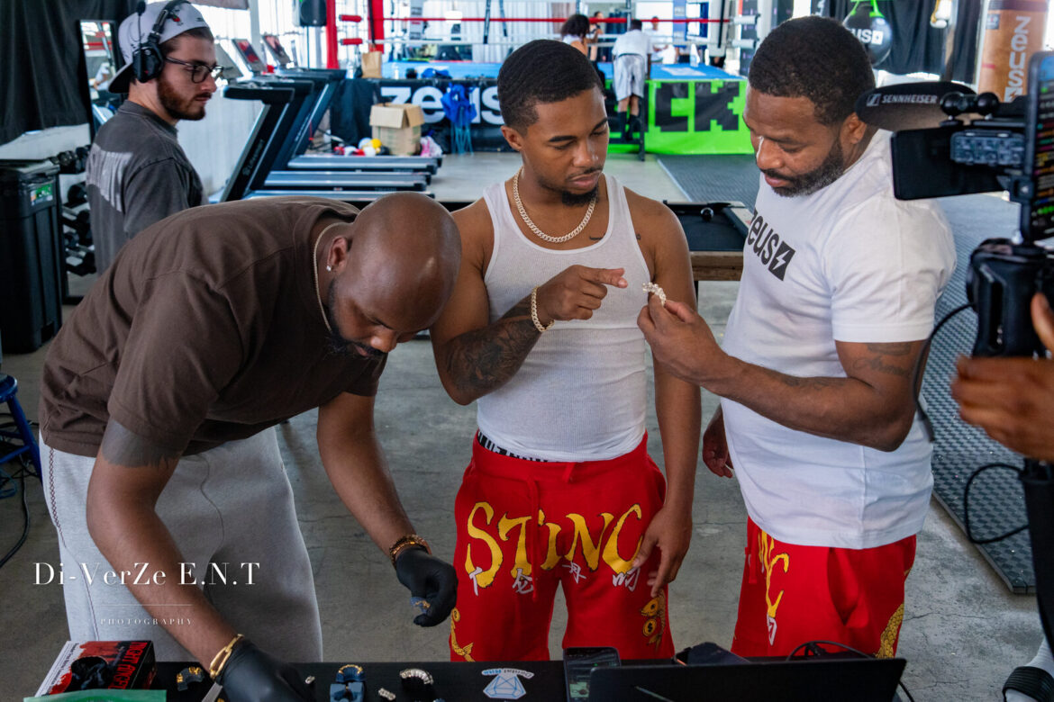 Dr. Trev fits a custom Dental Rite GrillzTainer at the Zeus Network Locked In-A-Thon fight camp - Di-VerZe E.N.T coverage 05